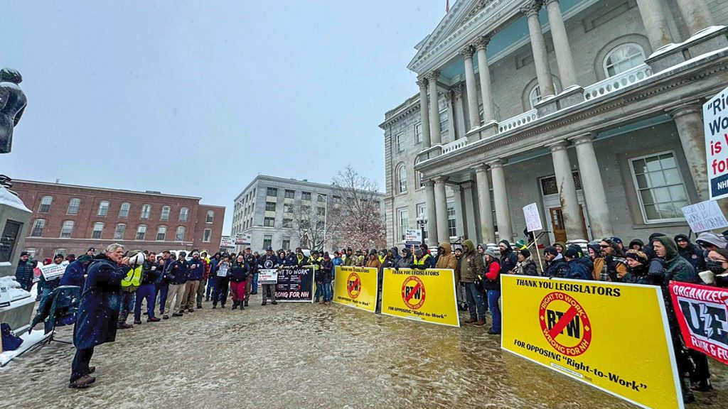 NH rally against right-to-work bill with yellow opposition signs by IBEW Local 2320